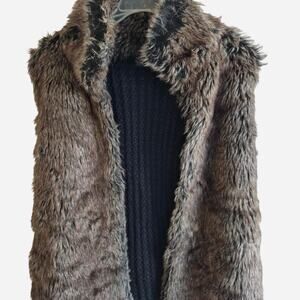 Soft and warm faux fur vest with crochet back